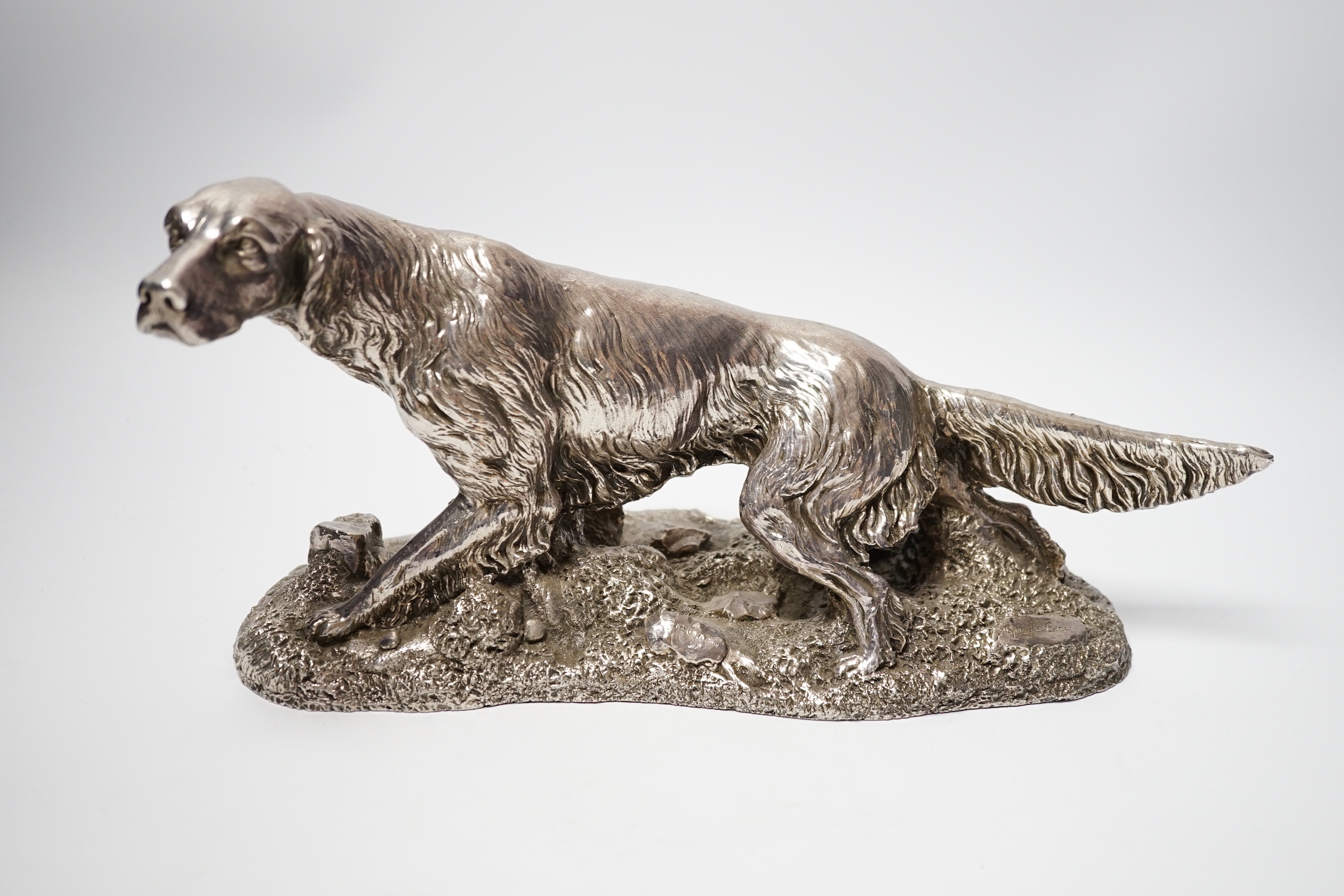 A modern filled silver model of an Irish Setter, by Camelot Silver Ltd, after Giuseppe Griecco?, Sheffield, 1998, length 31cm.